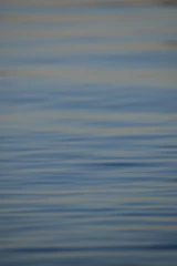 A tranquil scene illustrating the transition between waking, dreaming, and deep sleep states.
