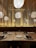 A beautifully set dining area showcasing a sleek wooden dining table and modern chairs.