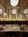 A beautifully set dining area showcasing a sleek wooden dining table and modern chairs.