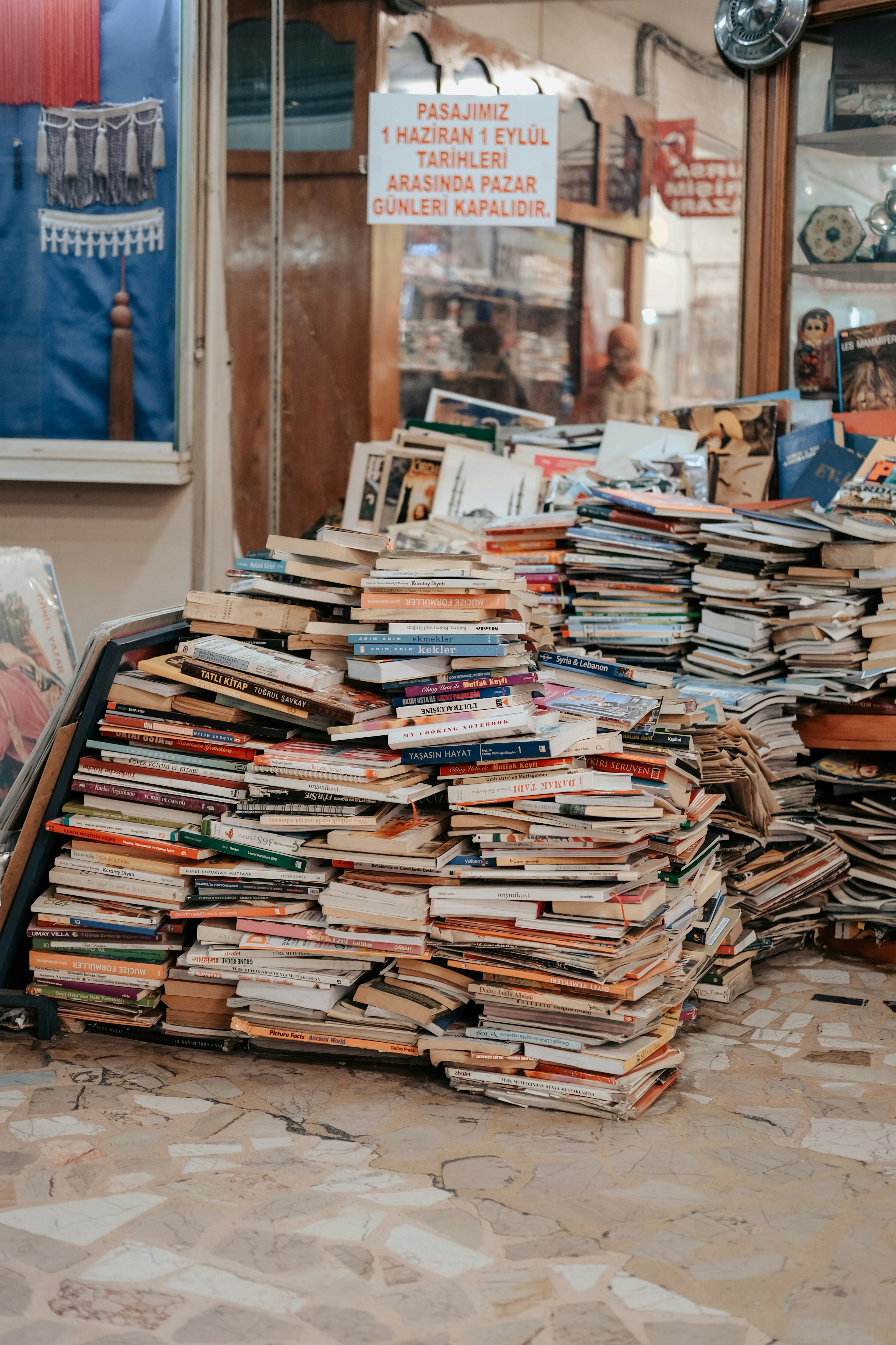 a pile of books sitting on top of a table