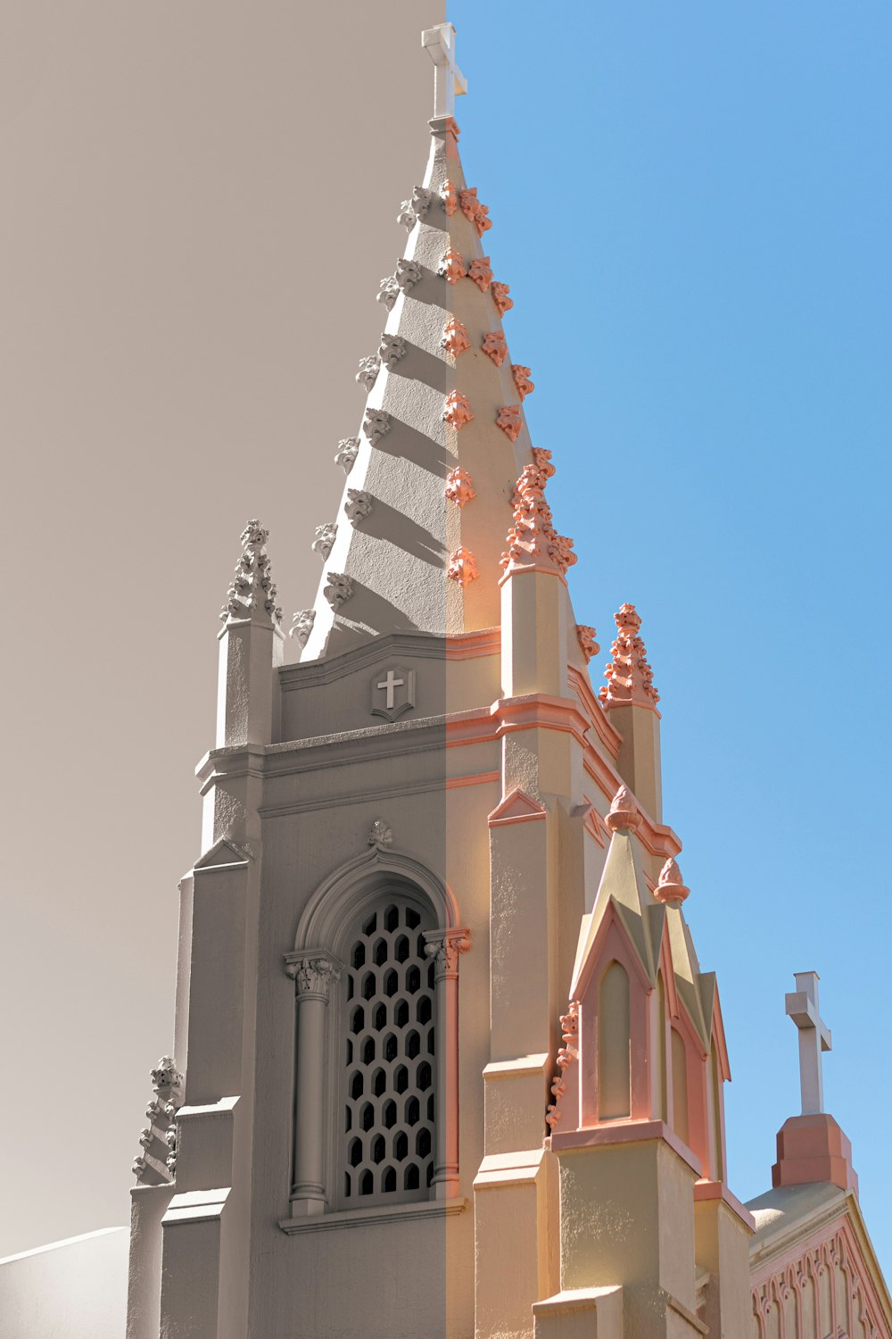 a church steeple with a cross on the top