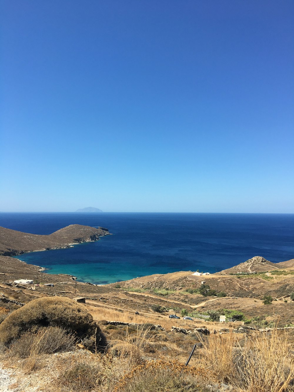 a view of a body of water from a hill