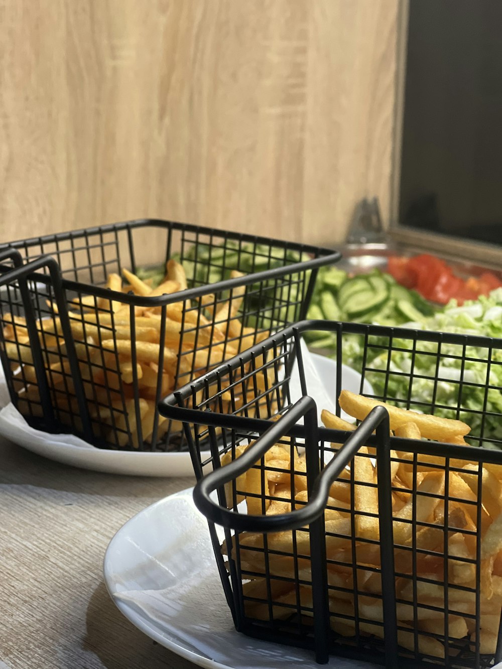 a couple of baskets filled with food on top of a table