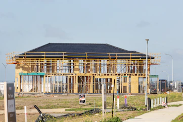 a house under construction with a lot of scaffolding