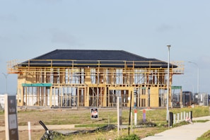 a house under construction with a lot of scaffolding
