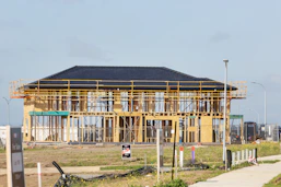 a house under construction with a lot of scaffolding