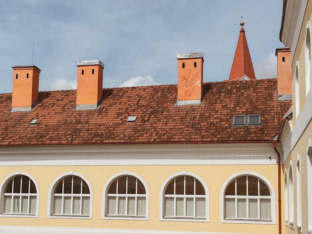 a row of windows on top of a building