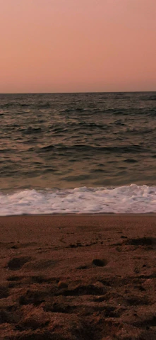 A peaceful beach scene at sunset symbolizing calm and care.
