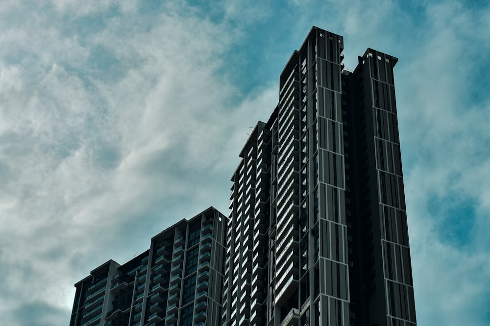 a very tall building with a sky background