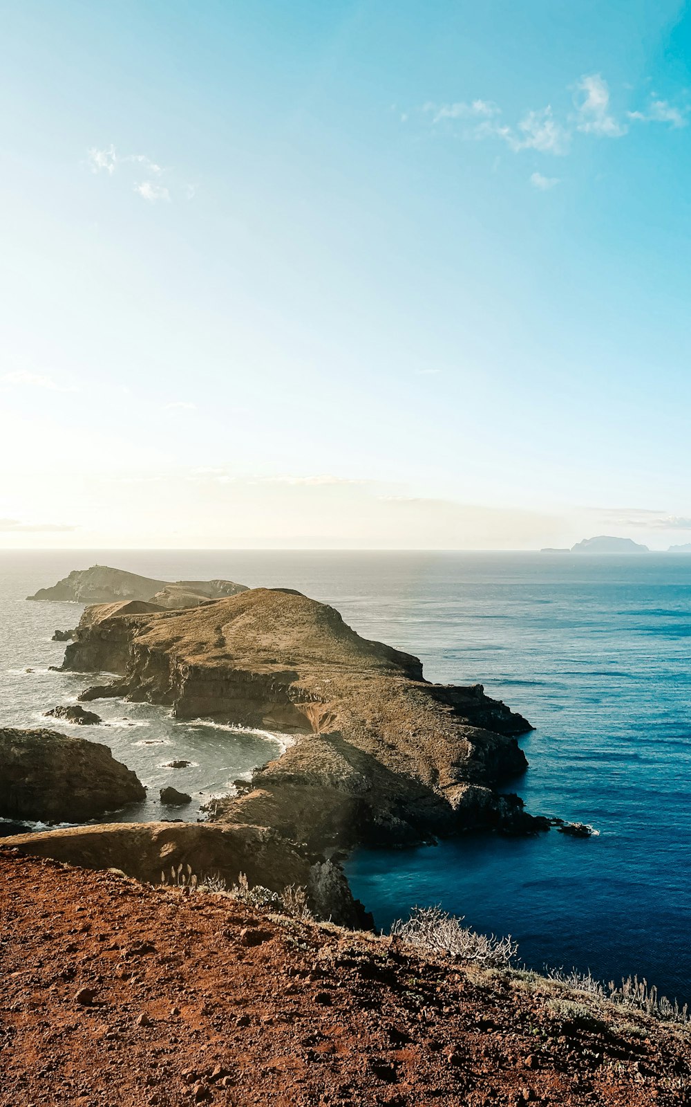 a view of a body of water from a hill