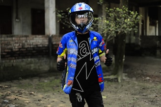 Satisfied customer shaking hands with a Performansmoto technician beside a tuned vehicle.