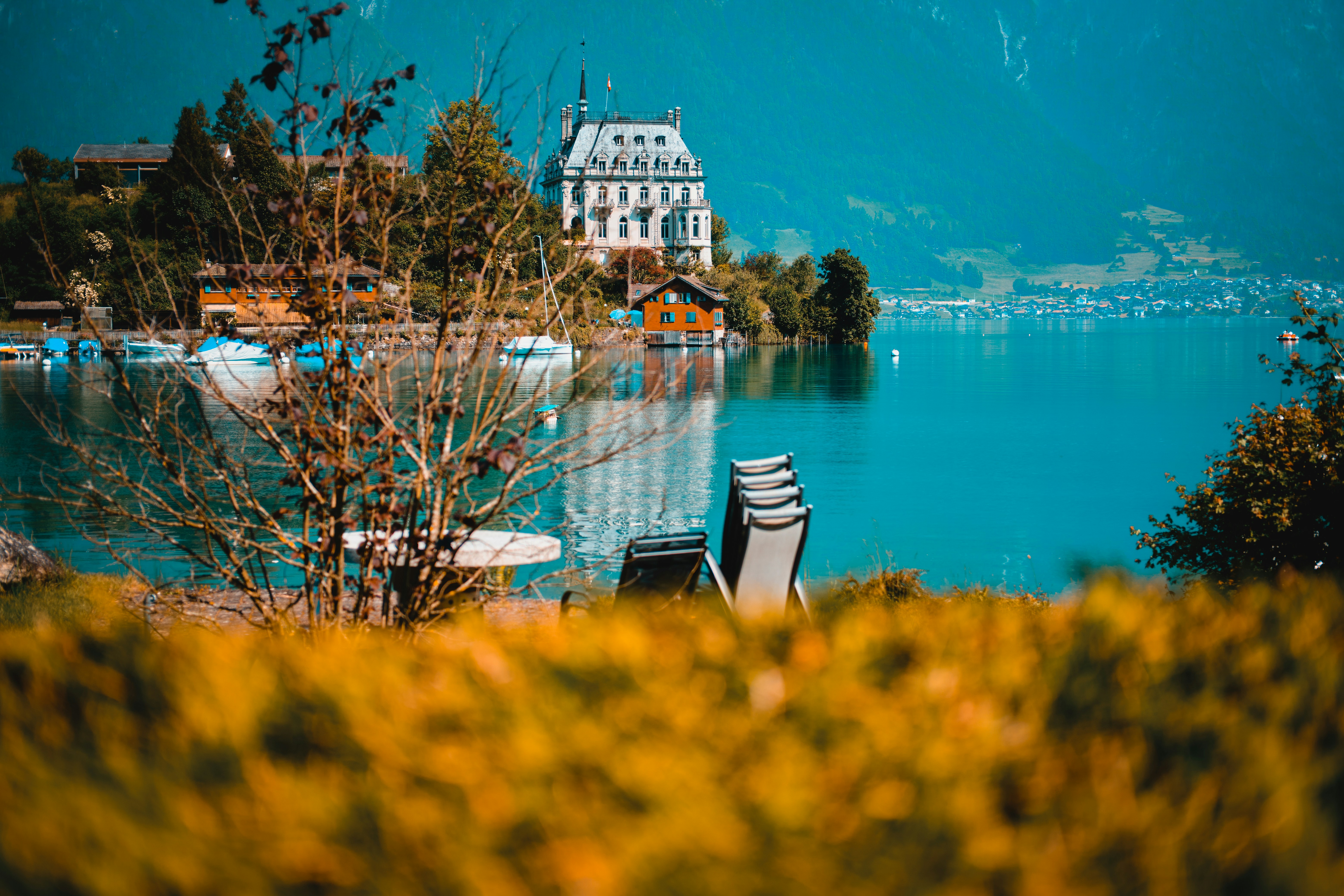 a view of a lake with a house in the background