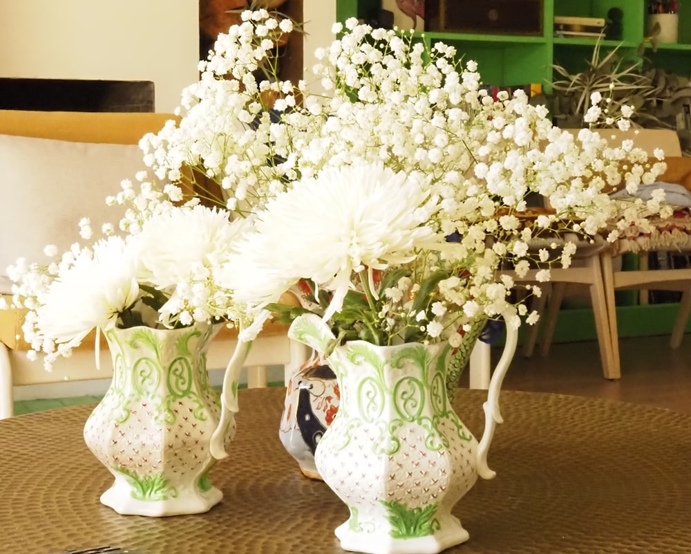 a couple of vases that are sitting on a table