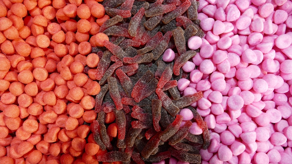 a close up of a variety of candy candies