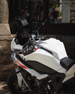 A stunning BMW R1300 GS parked against the backdrop of the Atlas Mountains.