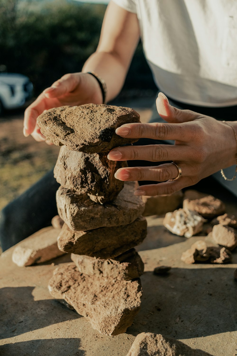 A person stacking rocks on top of each other photo – Free Image on Unsplash