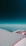 An aerial view showing an airplane wing and engine against a backdrop of the sky. The horizon is visible in the distance, with a gradient from deep blue at the top to lighter shades near the horizon.
