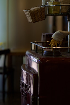 A sleek popcorn maker popping fresh kernels in a cozy kitchen corner.