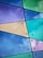 Colorful glass panels intersect with black lines, forming geometric shapes. Each panel displays vibrant shades of blue, purple, green, and yellow. Metallic rivets are visible at intersecting points, enhancing the modern and artistic appearance.