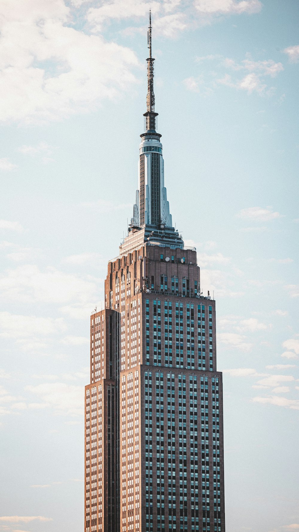 a very tall building with a very tall spire