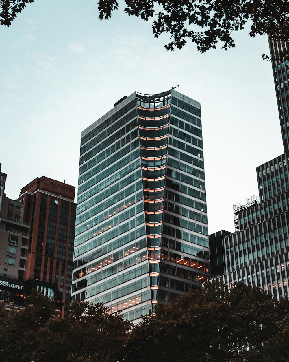 a very tall building in the middle of a city