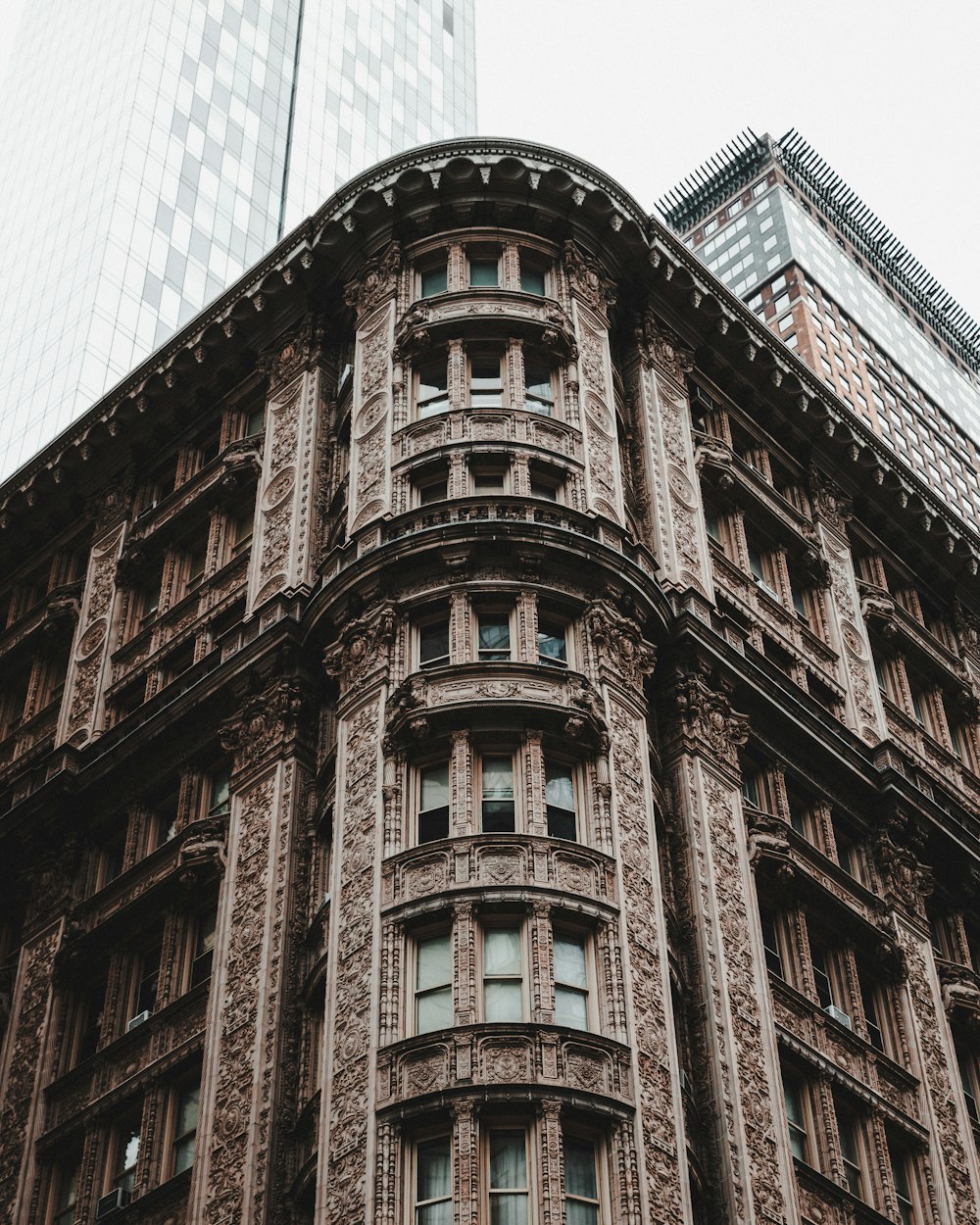 a tall building with a clock on the front of it