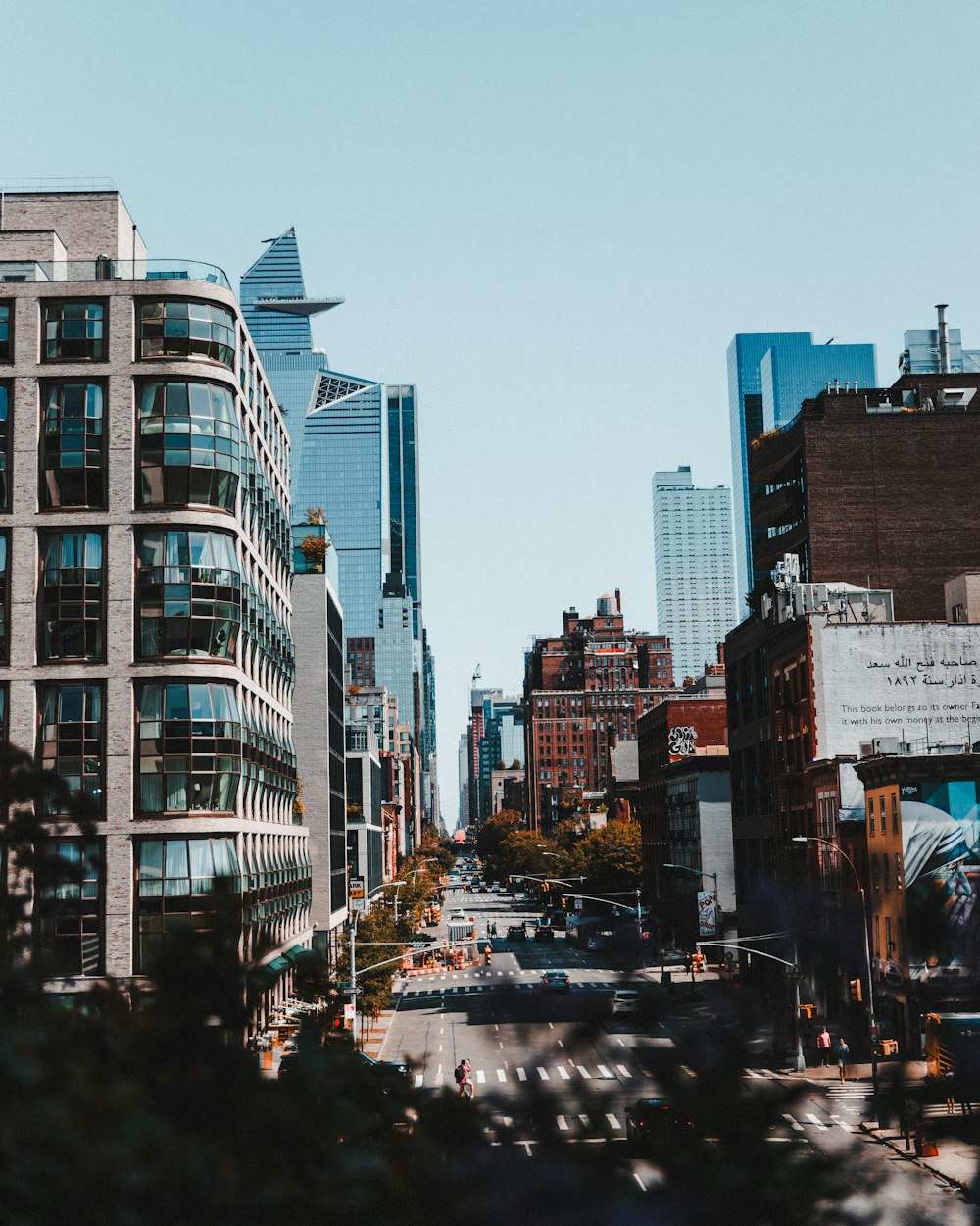 a city street filled with lots of tall buildings