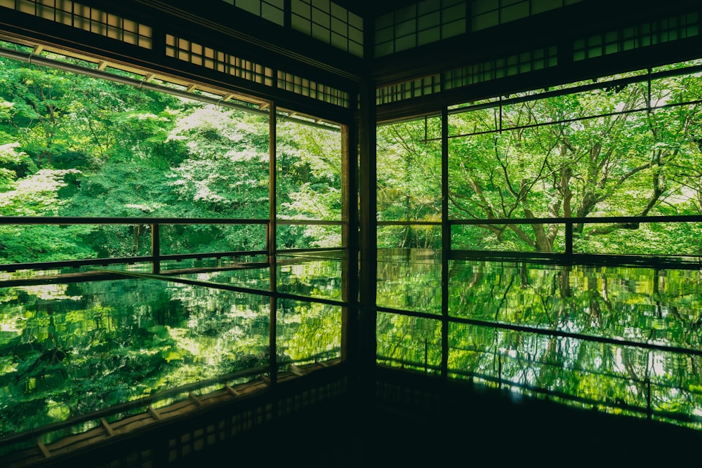 a room that has a lot of windows in it