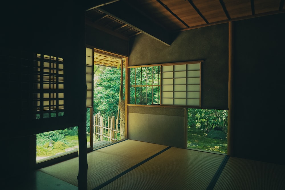 an empty room with a sliding glass door