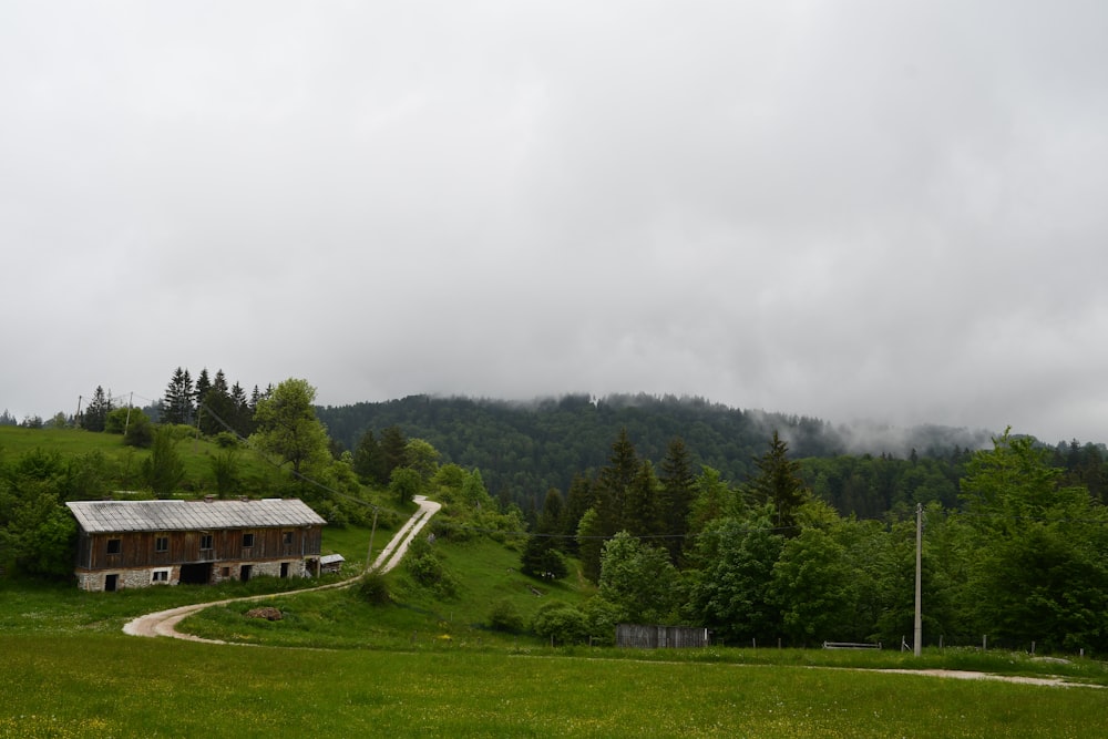 a house on a hill with a path going up it