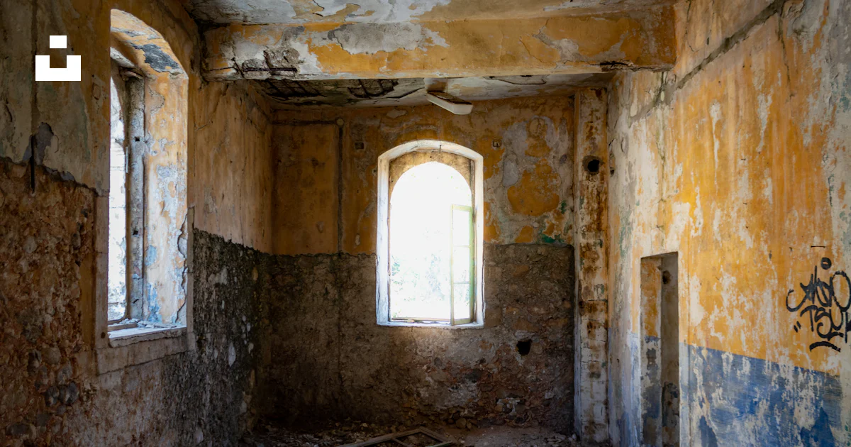 A run down room with graffiti on the walls photo – Free Crete Image on ...