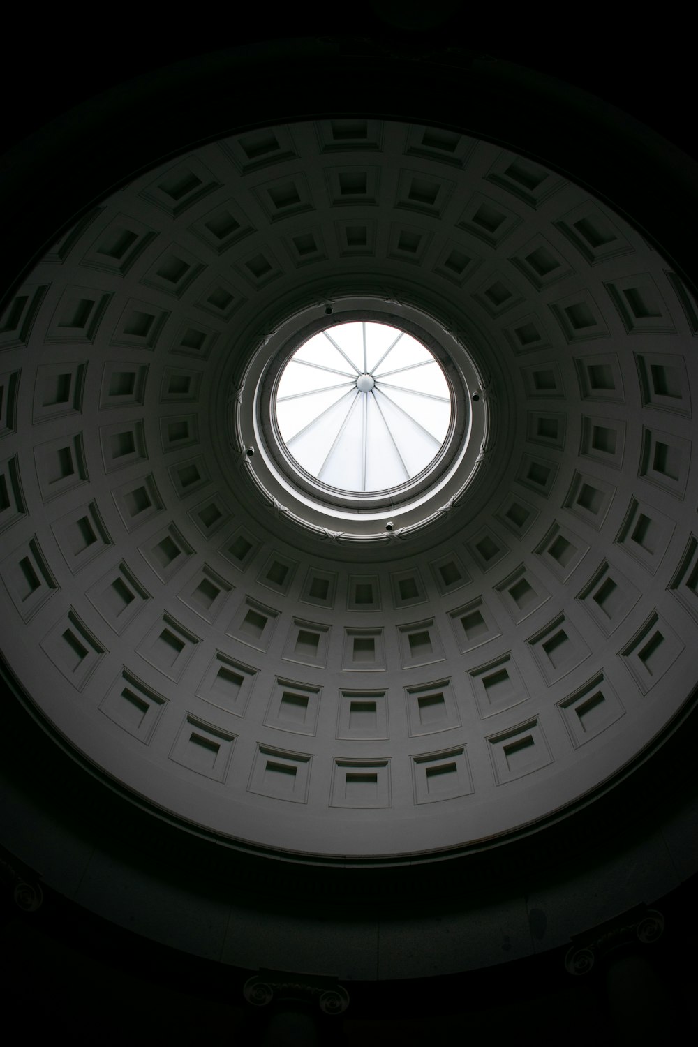 a circular window in the ceiling of a building