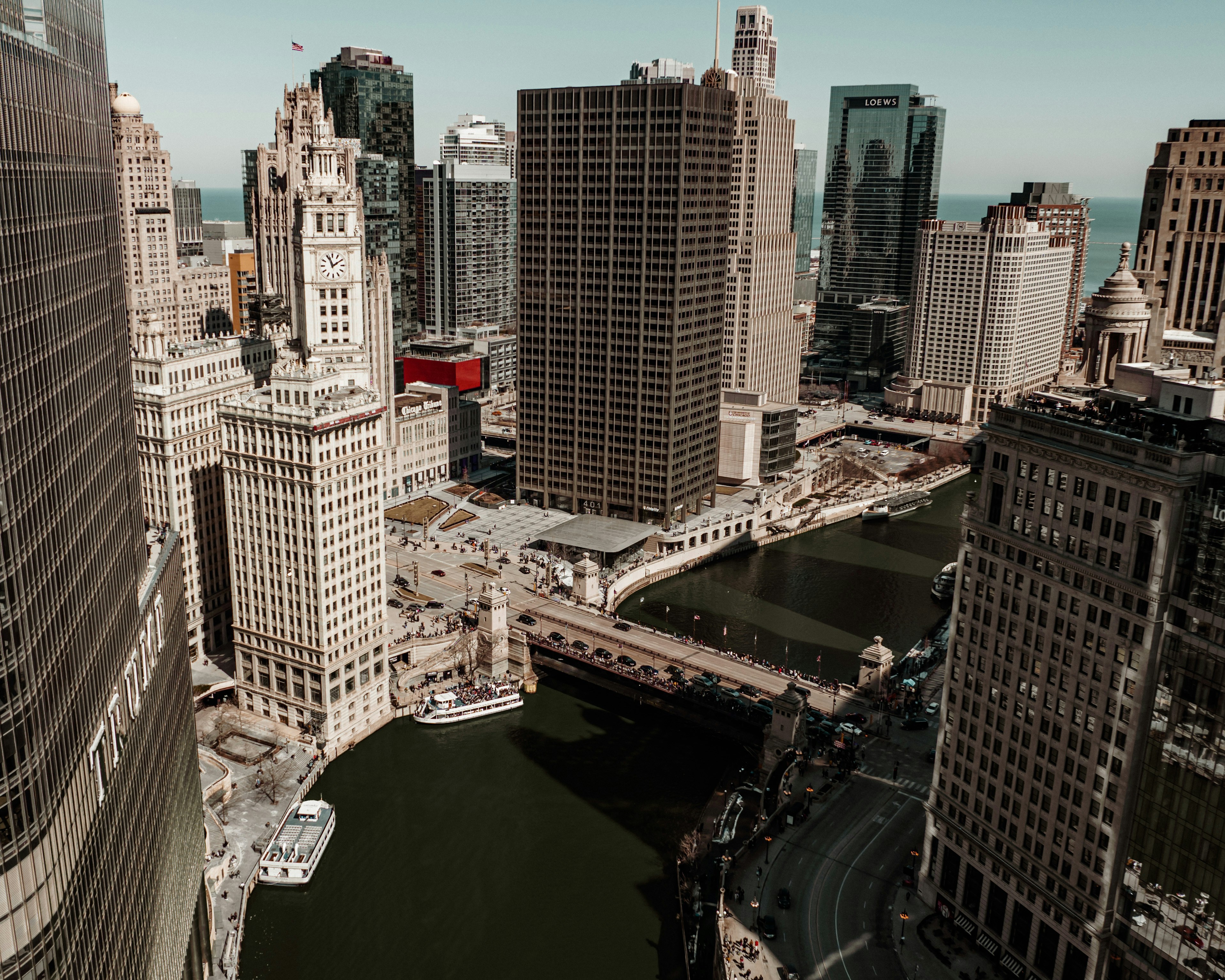 an aerial view of a river running through a city