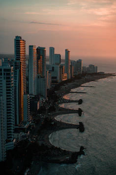 a large body of water next to a large city