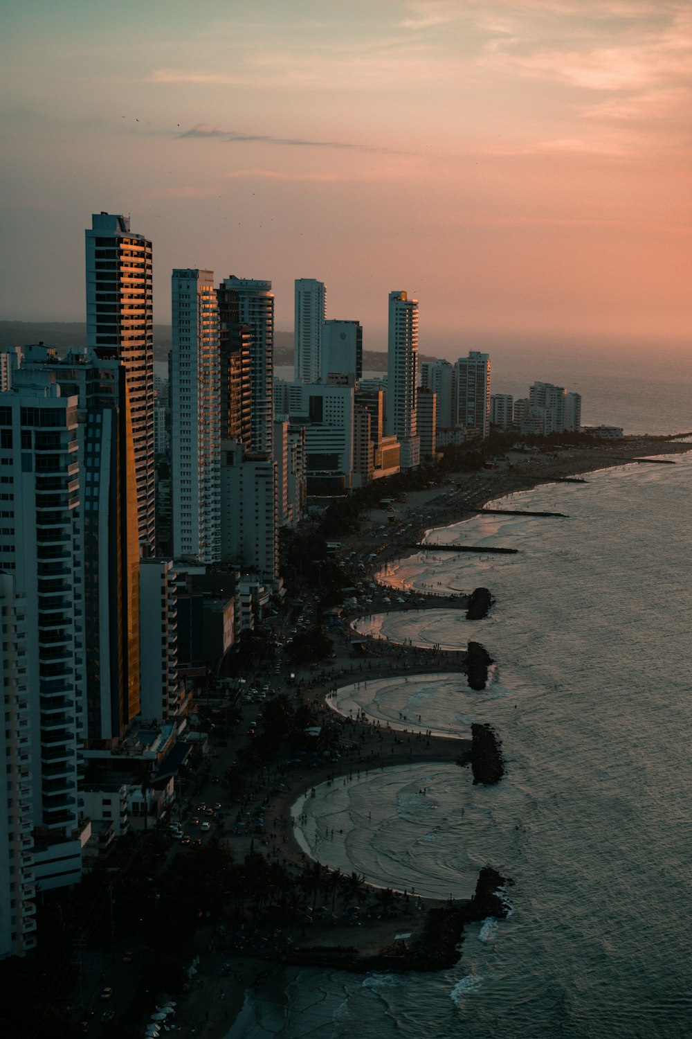 a large body of water next to a large city