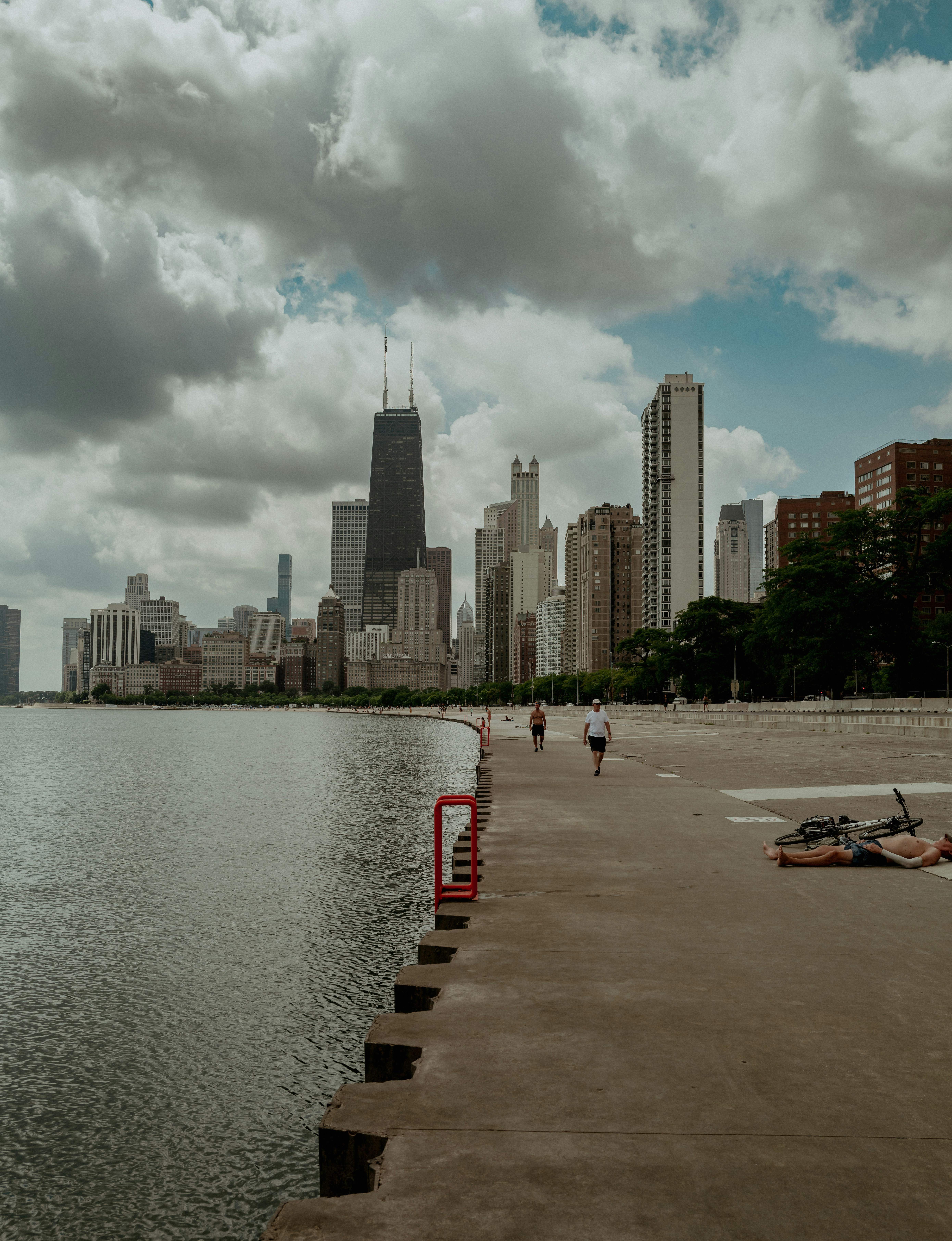 a body of water with a city in the background