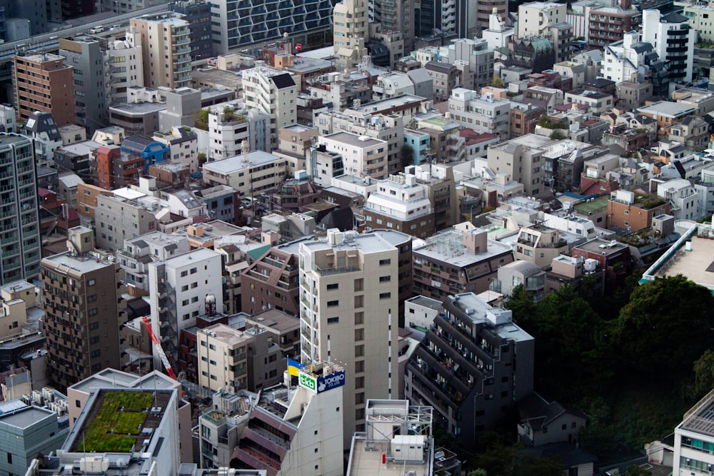 an aerial view of a city with tall buildings