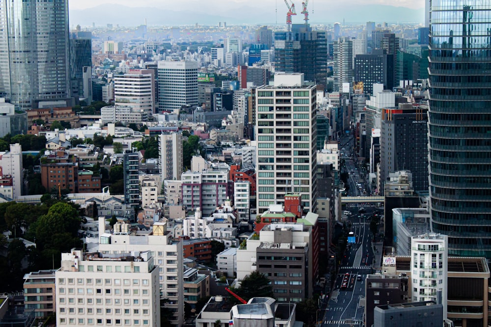 a view of a city with tall buildings