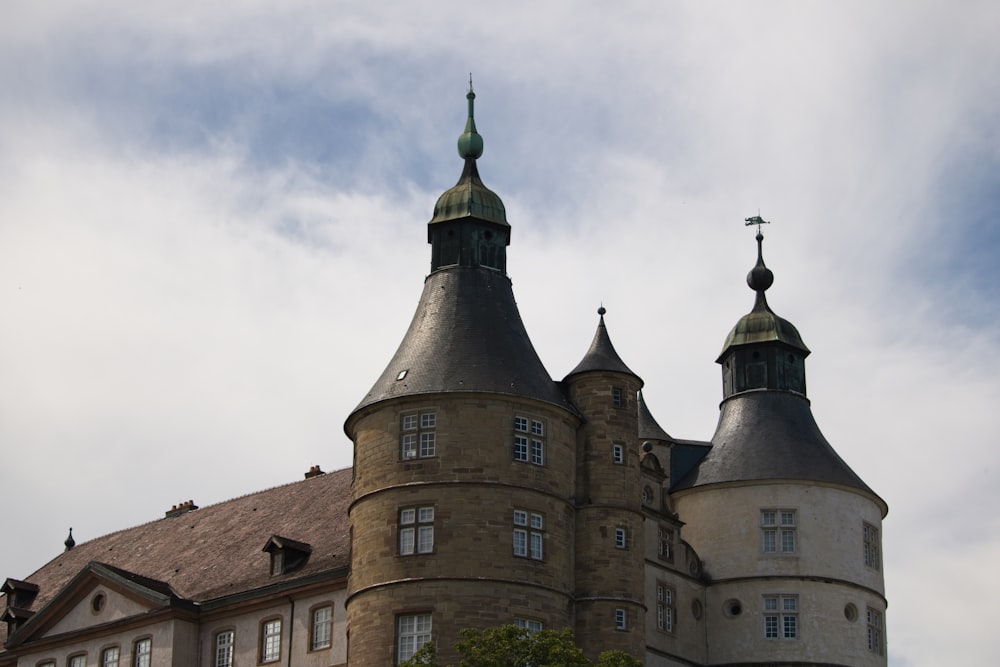 a large building with two towers on top of it