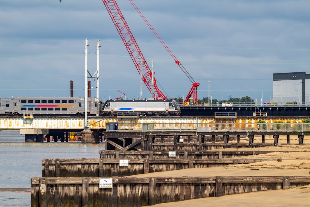 a crane that is on a bridge over a body of water