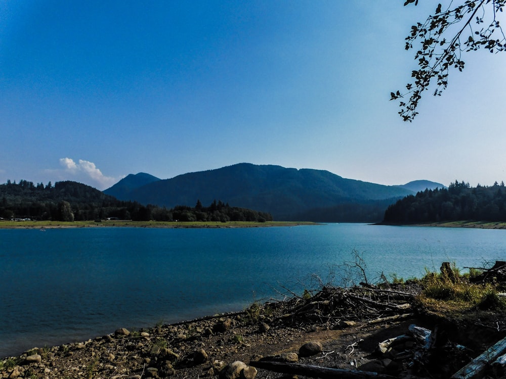 a large body of water surrounded by mountains