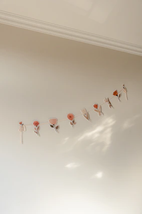 A custom 3D printed interior craft showcasing a delicate floral design in soft pastel tones.