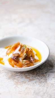 Artistic arrangement of fresh curd, milk powder, and rice powder in rustic bowls.