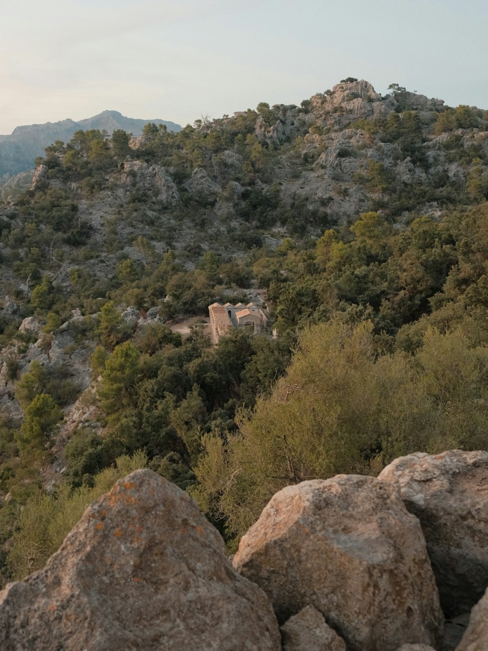 a view of a mountain with a castle on top of it