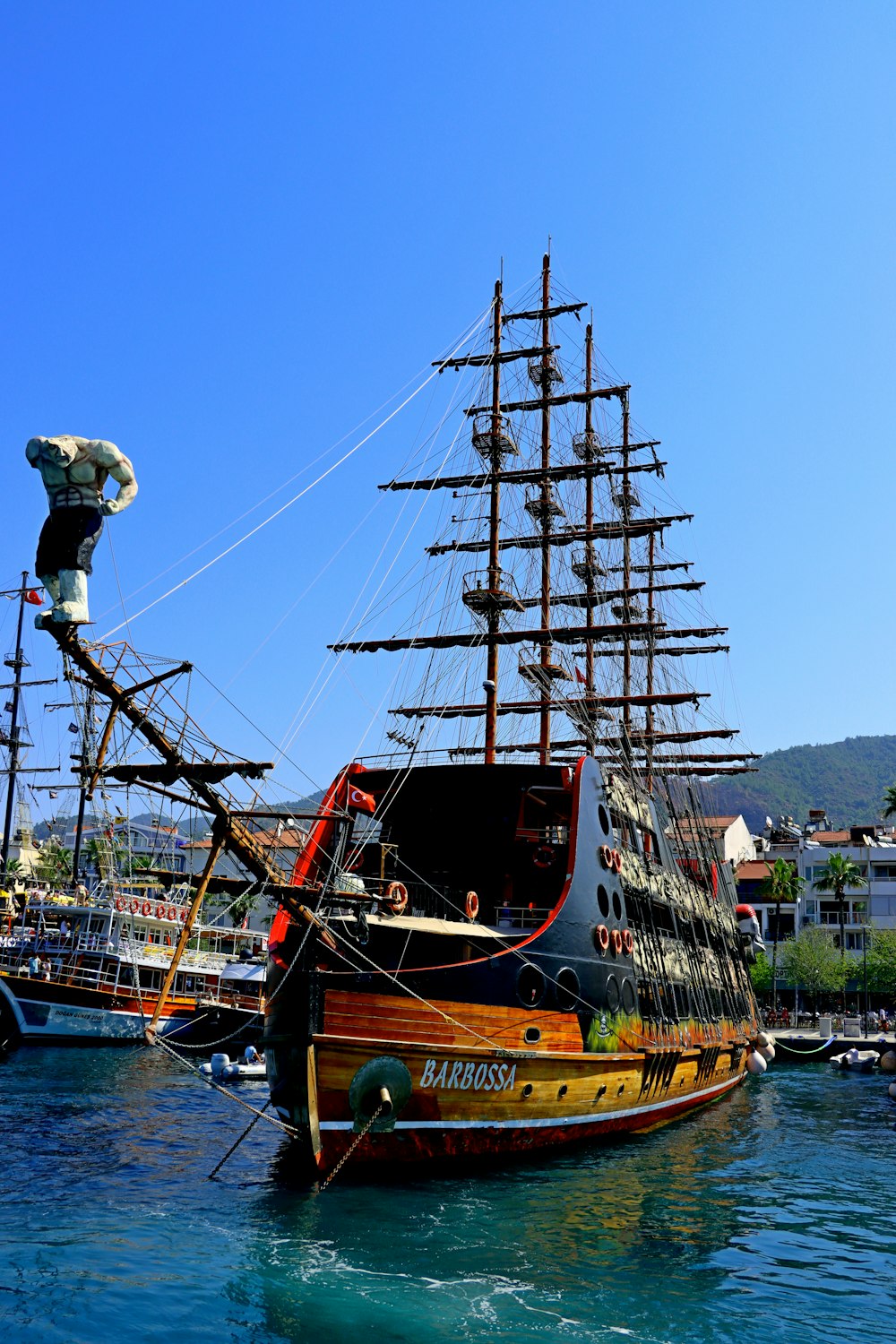 a large boat floating on top of a body of water