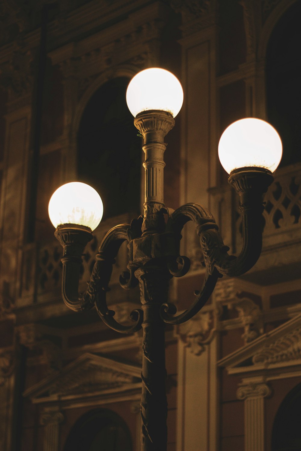 a street light with three lights on it