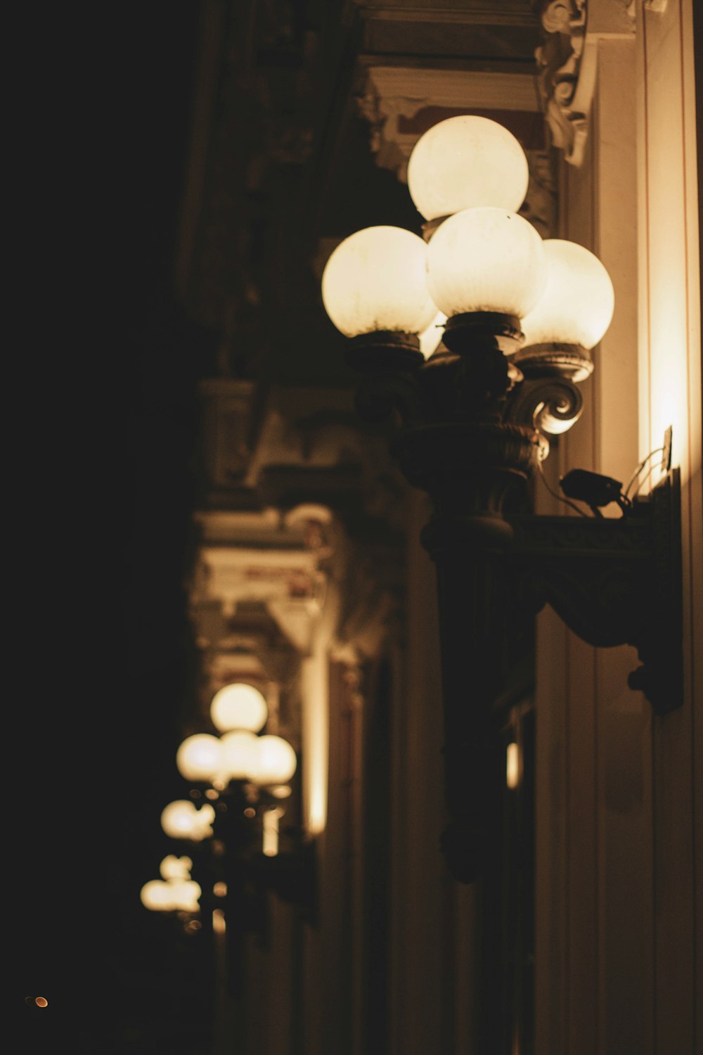 a street light on the side of a building