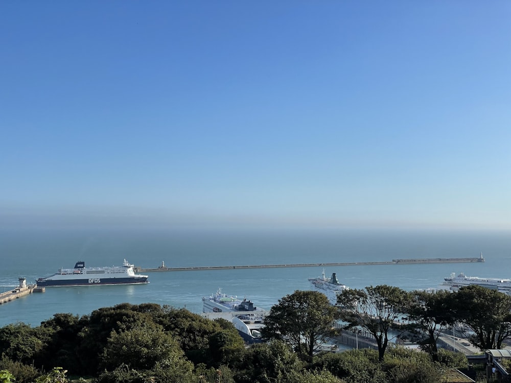 a cruise ship is docked at a pier