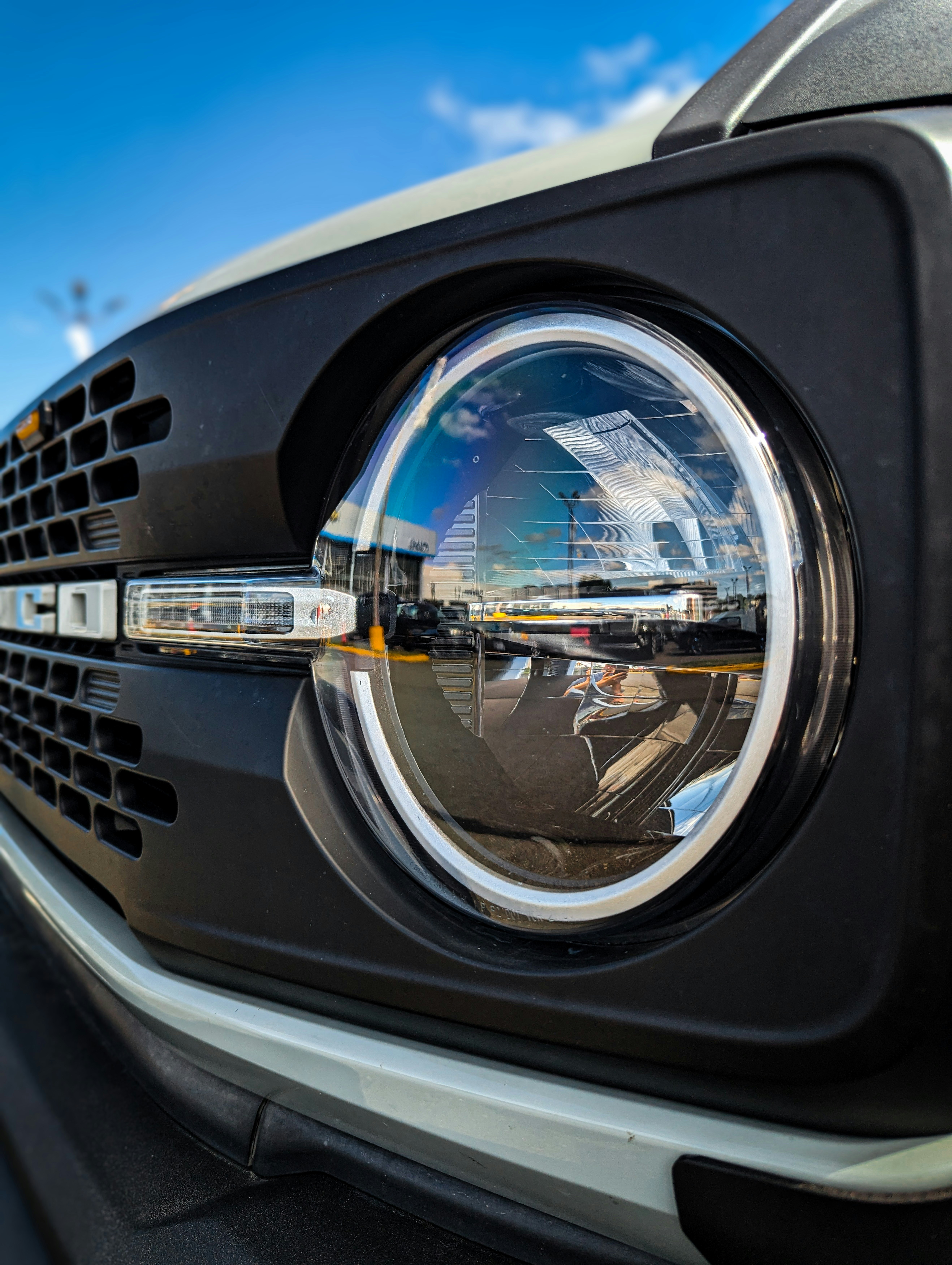 a close up of a car's rear view mirror