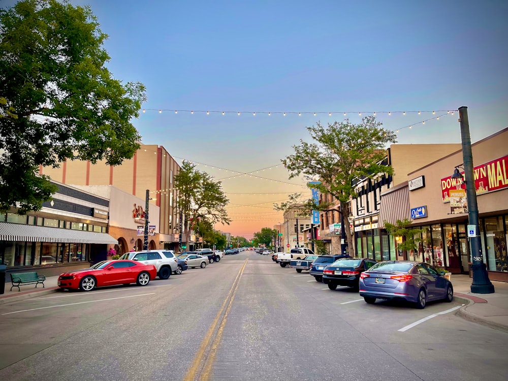 a street with cars parked on both sides of it